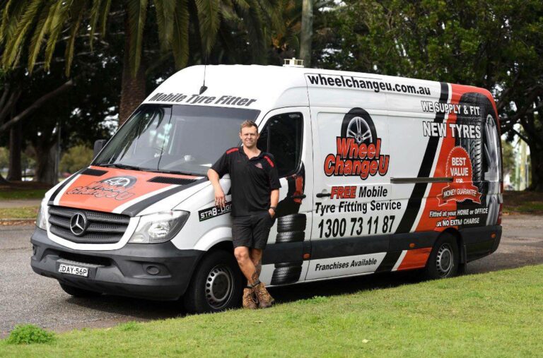 Photo of Allan from Wheel Change U Newcastle in front of a WCU van